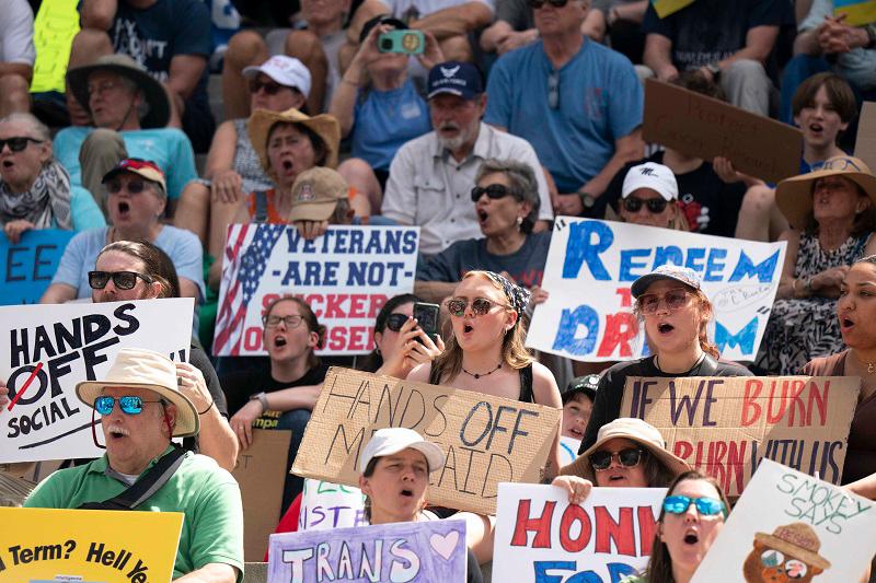 Thousands march in US against Trump ‘devastation’ Thousands march in US against Trump ‘devastation’