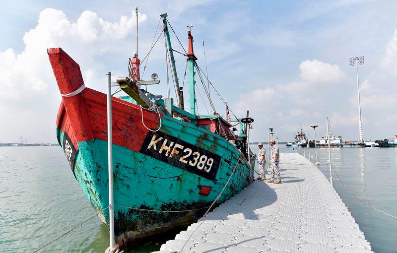 Three fishermen jump overboard from burning boat, one missing Three fishermen jump overboard from burning boat, one missing