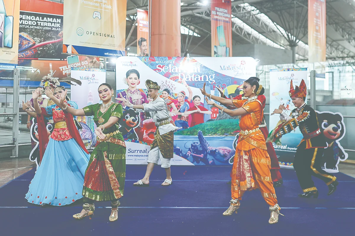 Tourists welcomed at KL Sentral with cultural dances