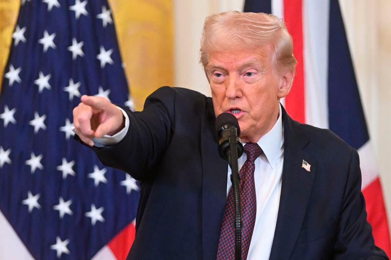 Trump says China to face added 10% tariff starting in March