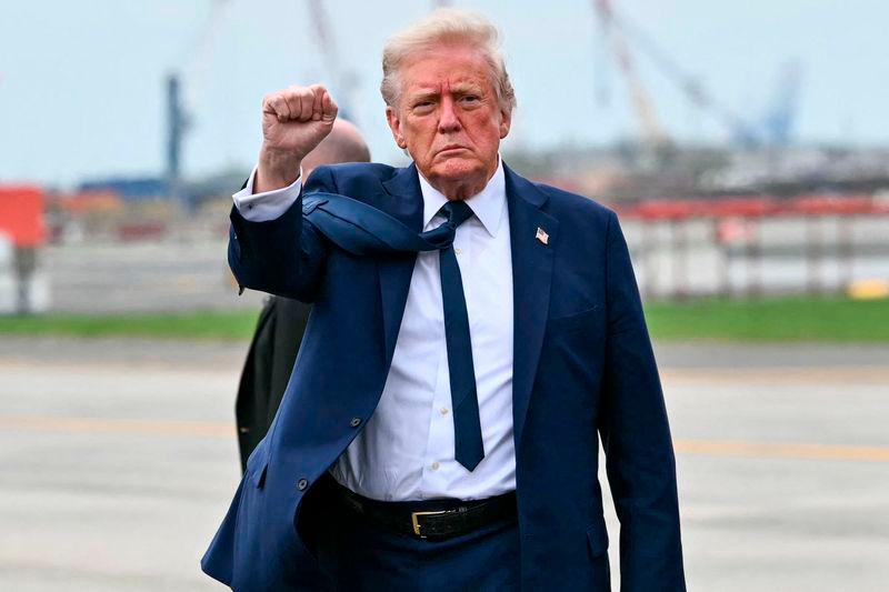 Trump urges 'free' transit for US ships through Panama, Suez canals