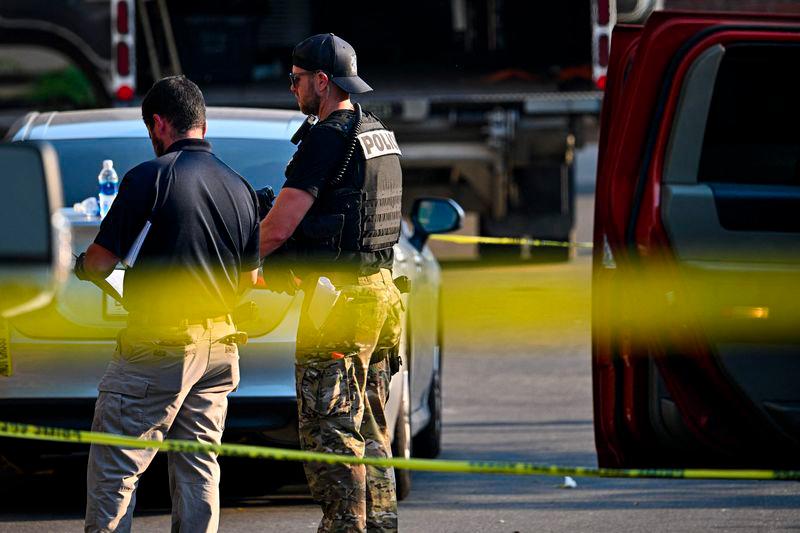 Two dead as police officer's son opens fire at US university Two dead as police officer's son opens fire at US university