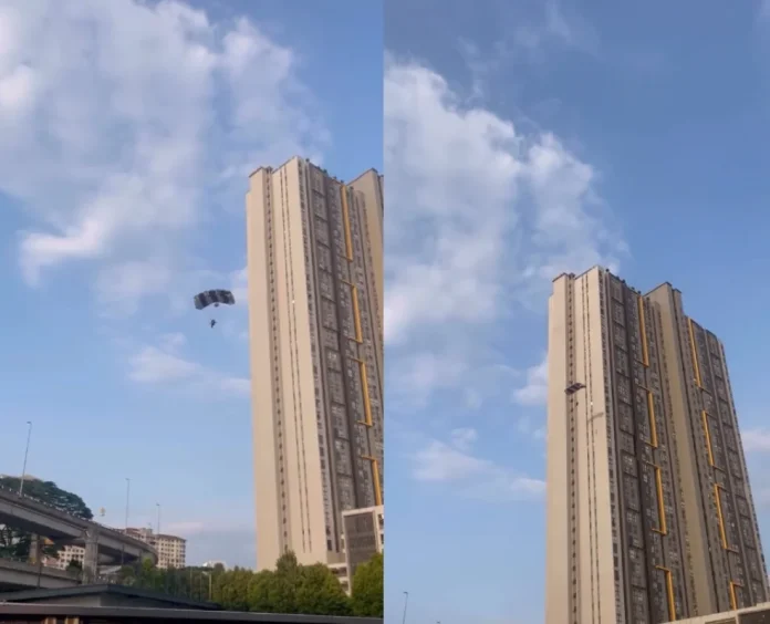 Viral video captures individual parachuting from top of KL building