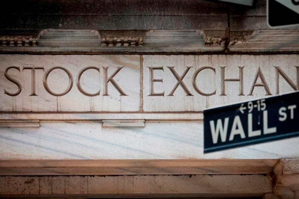 Wall Street lifted on hopes for softer Trump tariffs
