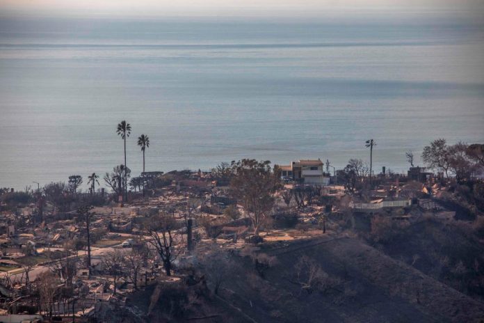 Wind lull offers hope in Los Angeles fires as blame game begins