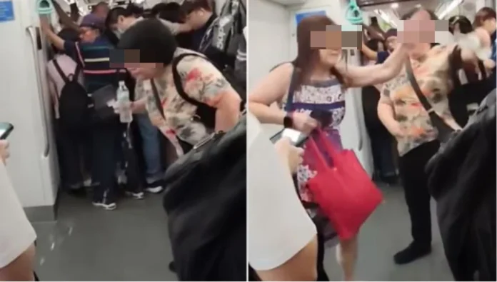 Woman_spits_water_all_over_SG_MRT_coach__passenger_intervenes Woman spits water all over SG MRT coach, passenger intervenes