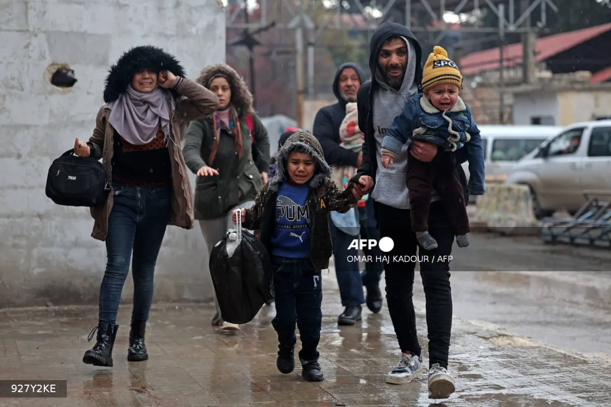afp-20260109-927y2ke-v1-mockup-syriaconflictkurdsaleppostrike Syrian army says swept Aleppo district after clashes with Kurdish fighters