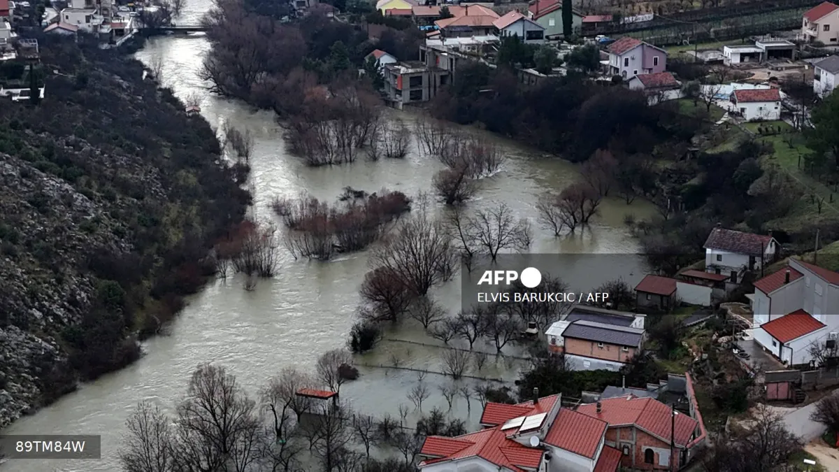 One dead as snow and rain cause floods, power cuts in Balkans