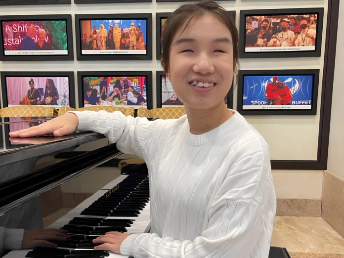 Lee says so far she is only adept at playing the piano as an instrument. – PIC COURTESY OF CASEY HOW