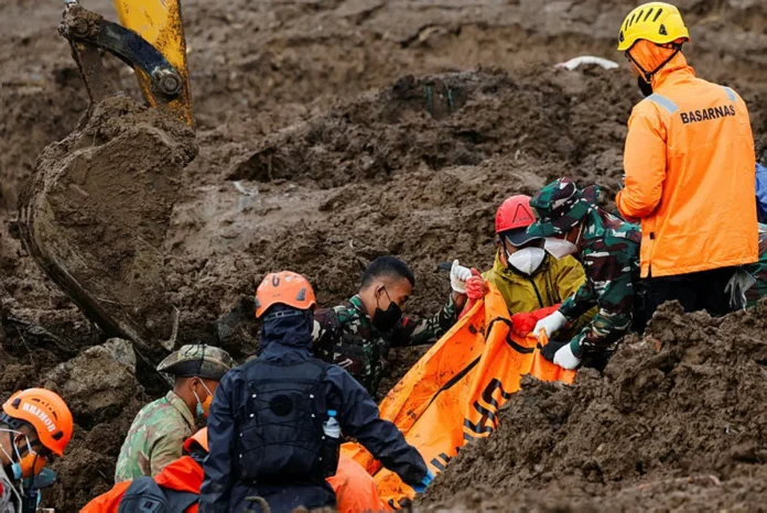 Search for 32 people missing in Indonesia landslide hampered by rain as death toll rises to 34