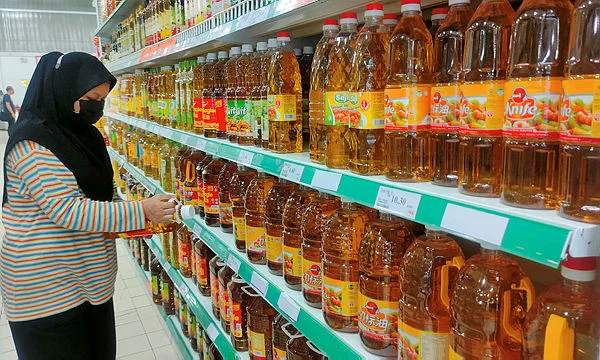 01_PAGE_1_-_SYED_AZAHAR_SYED_OSMAN_THESUN_ smuggling, cooking oil, Kelantan, arrest, subsidy