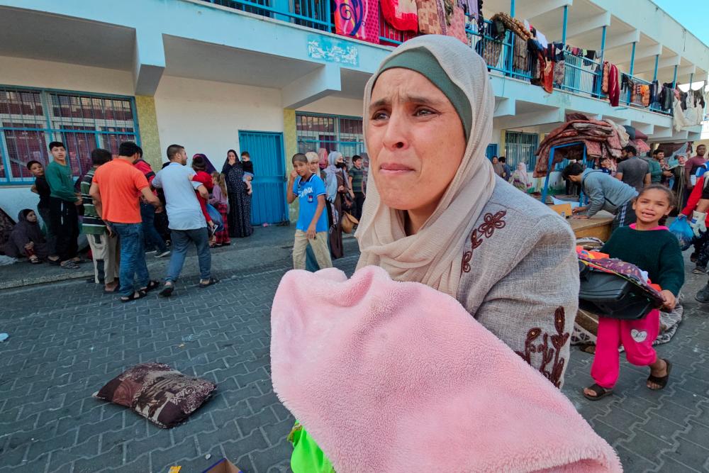 15 killed in Israeli airstrike on school sheltering displaced people in Gaza 15 killed in Israeli airstrike on school sheltering displaced people in Gaza