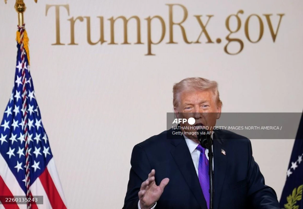 AFP__20260206__2260135243__v1__Mockup__PresidentTrumpAnnouncesTrumprxFromTheWhiteHou Trump posts election conspiracy video with Obamas depicted as monkeys