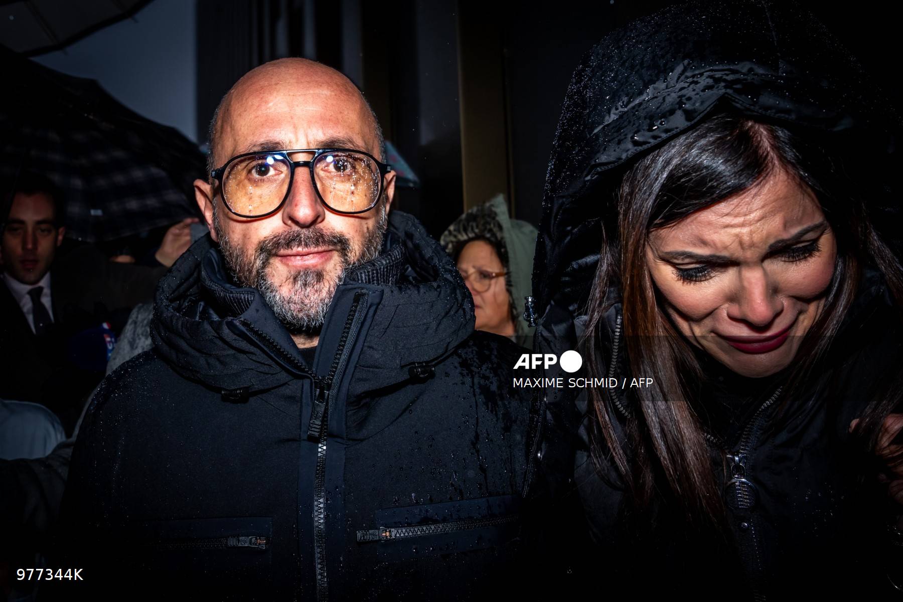 SWITZERLAND-ACCIDENT-FIRE Swiss bar owners confronted by grieving families over fatal fire