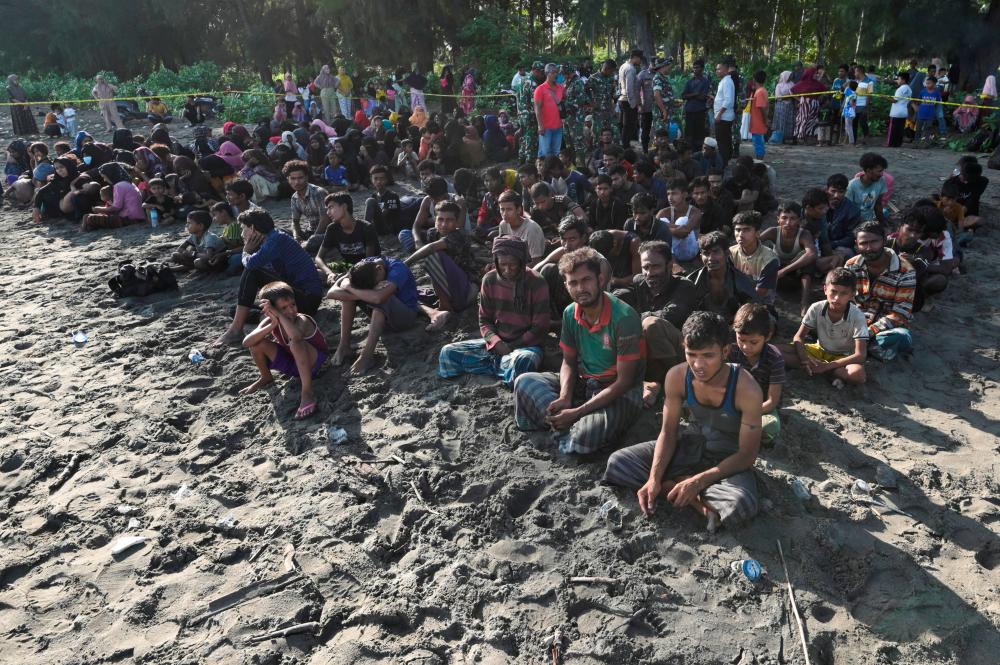 About 400 Rohingya land in Indonesia, adds to surge of recent arrivals About 400 Rohingya land in Indonesia, adds to surge of recent arrivals