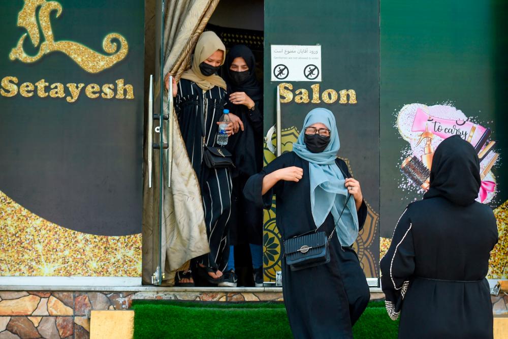 Afghan women protest against beauty parlour ban