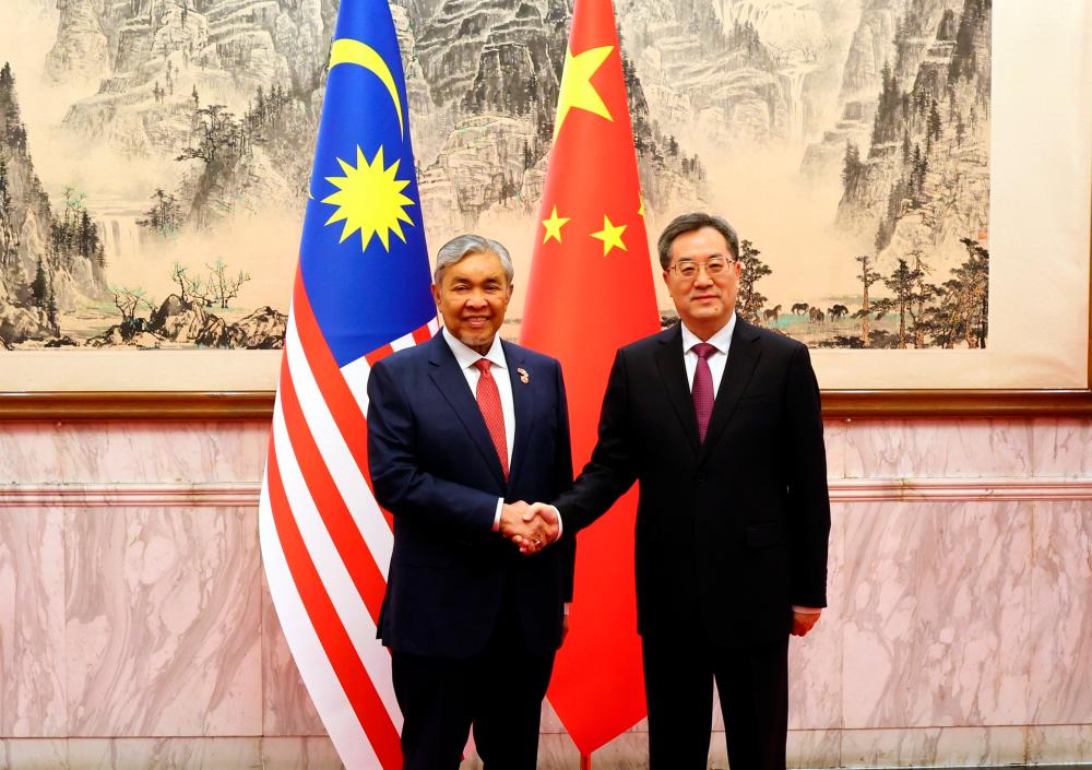 Ahmad Zahid, Xuexiang hold meeting in Beijing Ahmad Zahid, Xuexiang hold meeting in Beijing