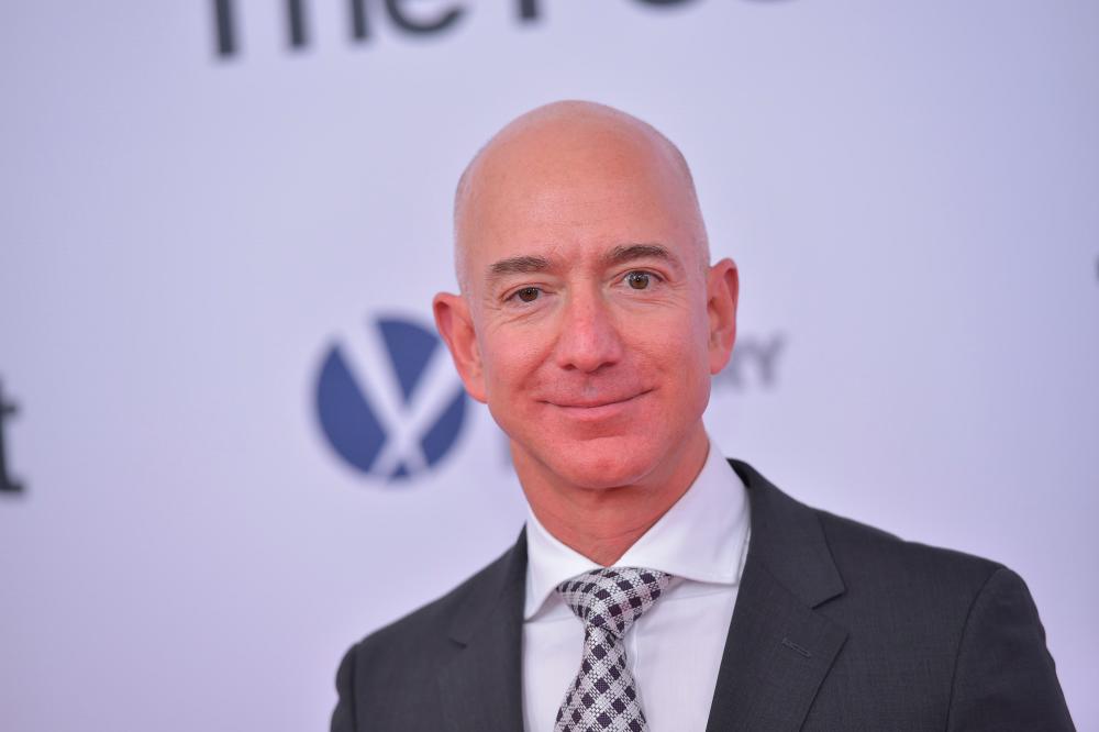 Amazon founder Bezos tops list of world’s richest people again Amazon founder Bezos tops list of world’s richest people again