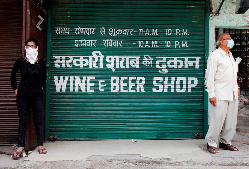 At least 36 die in India after drinking tainted liquor At least 36 die in India after drinking tainted liquor