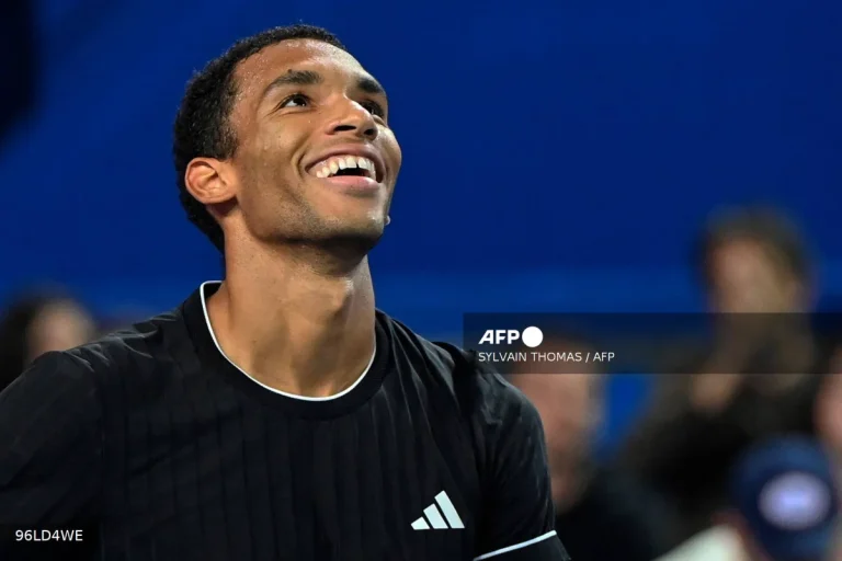 Auger-Aliassime survives six match points to advance in Dubai