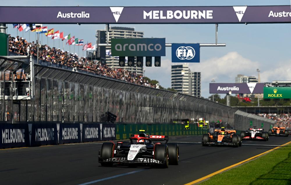 Australian F1 chief vows investigation after fans invade track Australian F1 chief vows investigation after fans invade track