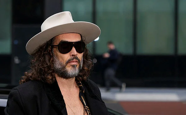 BRITAIN-COURT-BRAND_ UK comedian Russell Brand pleads not guilty to further rape, sex assault charges