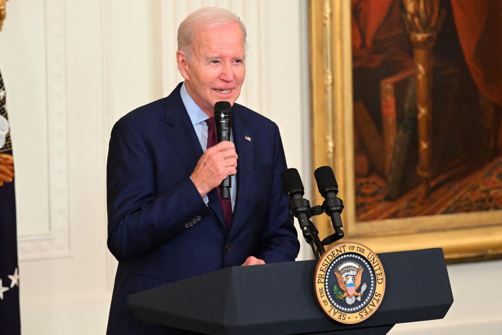 Biden cuts back Asia tour as hopes rise of debt deal