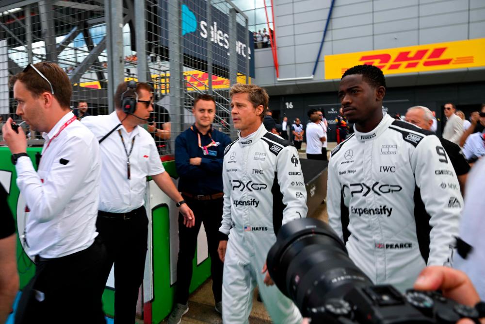 Brad Pitt suits up to film F1 blockbuster at British Grand Prix