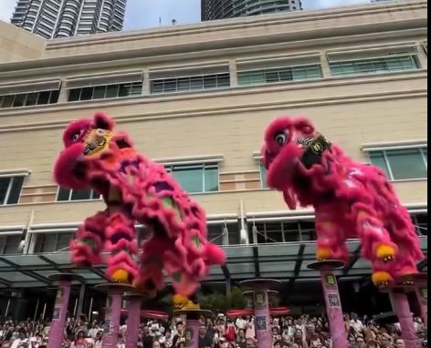 CNY 5 Lion dancers fall mid-performance at KLCC, rise to finish
