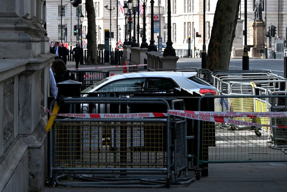 Car hits Downing Street gates but not ‘terror-related’: Police