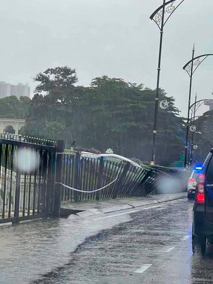 Car skids due to slippery road following rain, crashes into Istana Besar gate Car skids due to slippery road following rain, crashes into Istana Besar gate