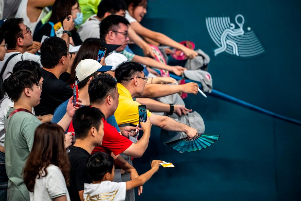 China clinches Asiad tennis men’s singles gold China clinches Asiad tennis men’s singles gold