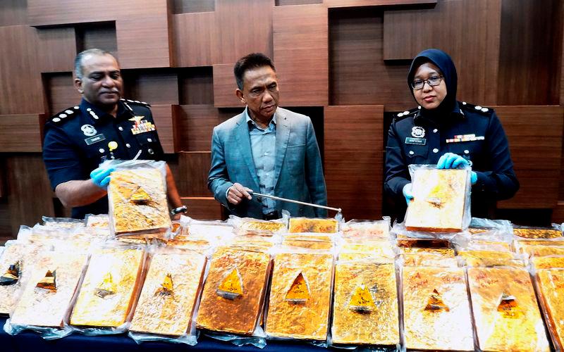Cops nab man, seize 100 compressed slabs of ganja in raid on homestay Cops nab man, seize 100 compressed slabs of ganja in raid on homestay