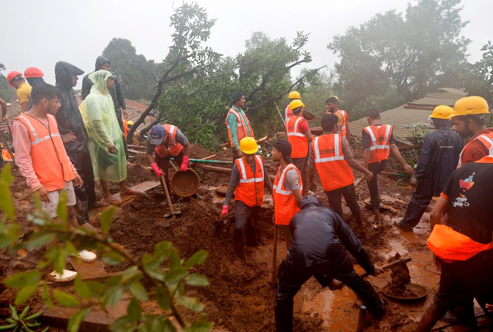 Death toll in Indian landslide rises to 26, dozens more feared trapped Death toll in Indian landslide rises to 26, dozens more feared trapped