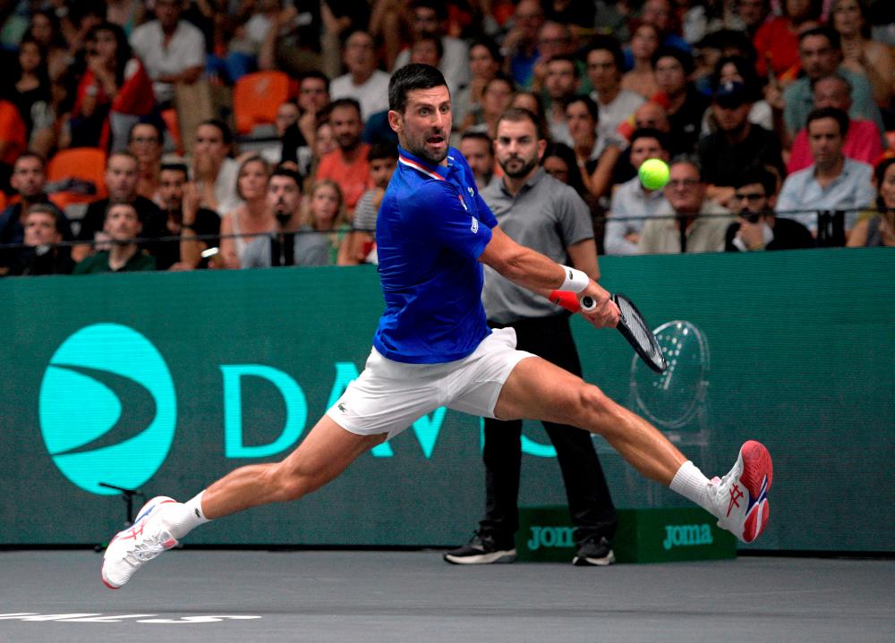 Djokovic powers Serbia into Davis Cup quarters, Britain win again