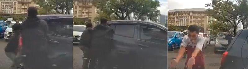 Double-parked car blocks parking, bystanders attempt to move it but fail Double-parked car blocks parking, bystanders attempt to move it but fail