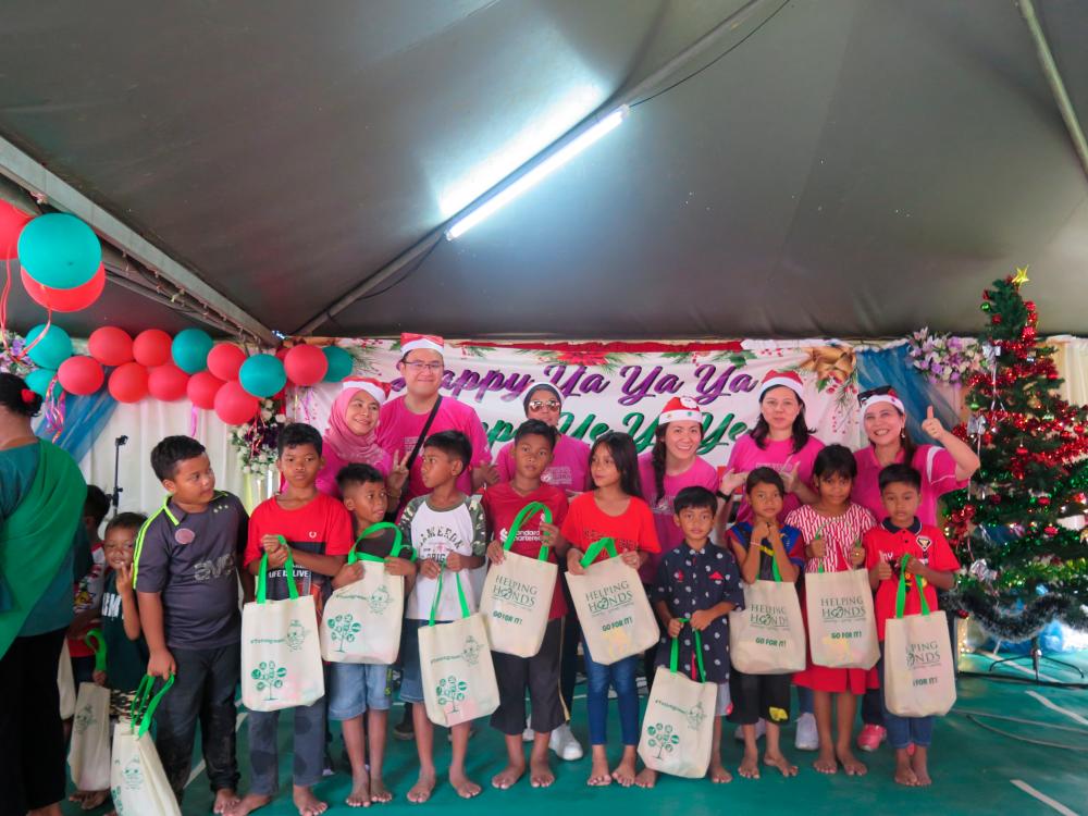 Early Christmas cheer at two Orang Asli villages