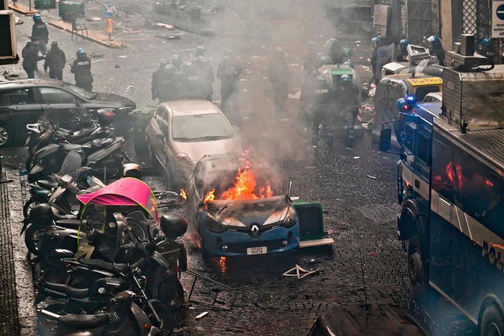 Eight arrested after Champions League violence in Naples