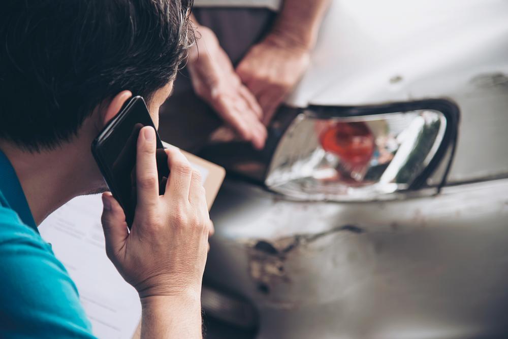 Elderly man sustains injuries after car crashes into lottery outlet