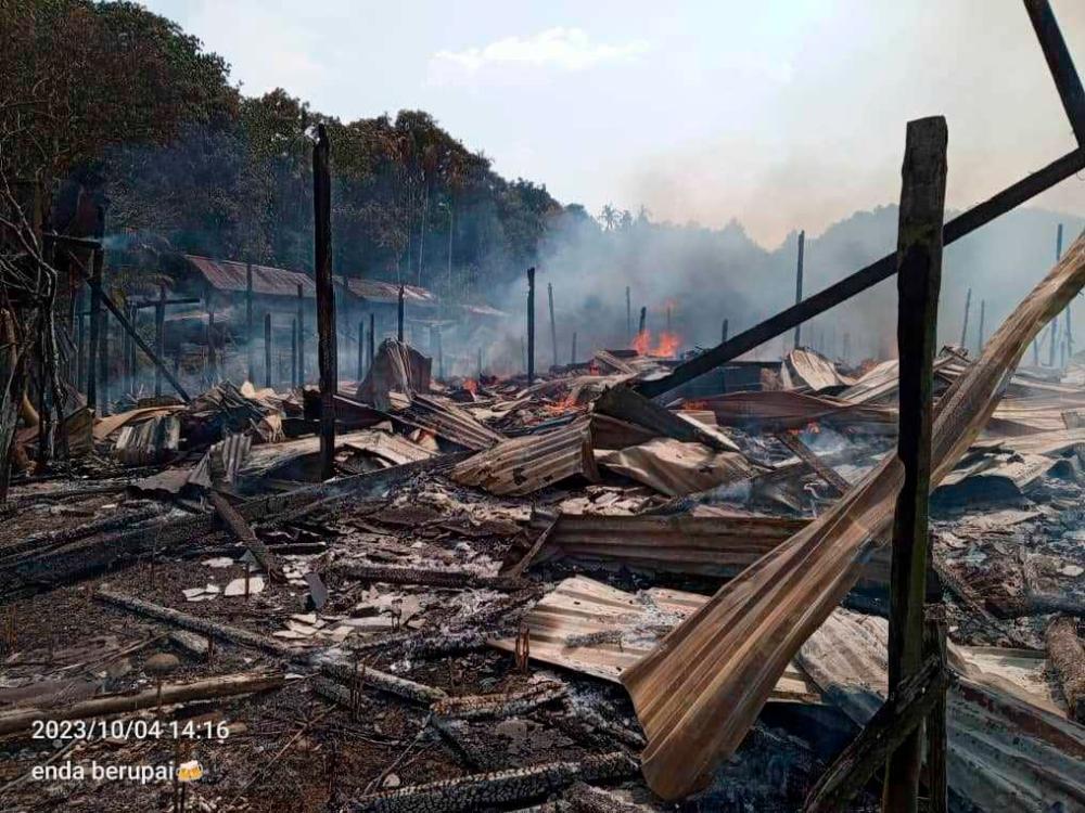 Elderly woman dies after being rescued from burning longhouse