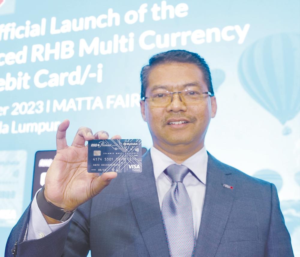 Enhanced RHB Visa debit card/-i supports 32 foreign currencies Enhanced RHB Visa debit card/-i supports 32 foreign currencies