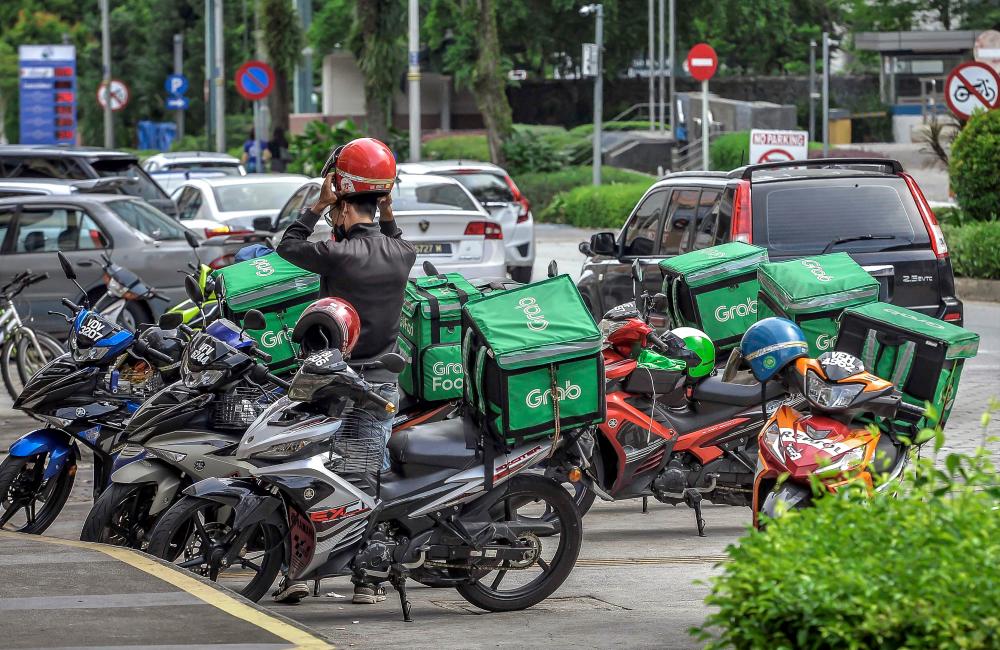 Foodpanda’s parent firm is in talks with Grab about selling a portion of their business