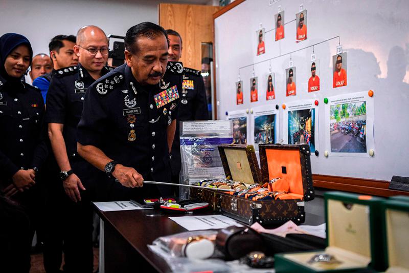 Forex, crypto ring busted, RM51 mln in luxury loot seized