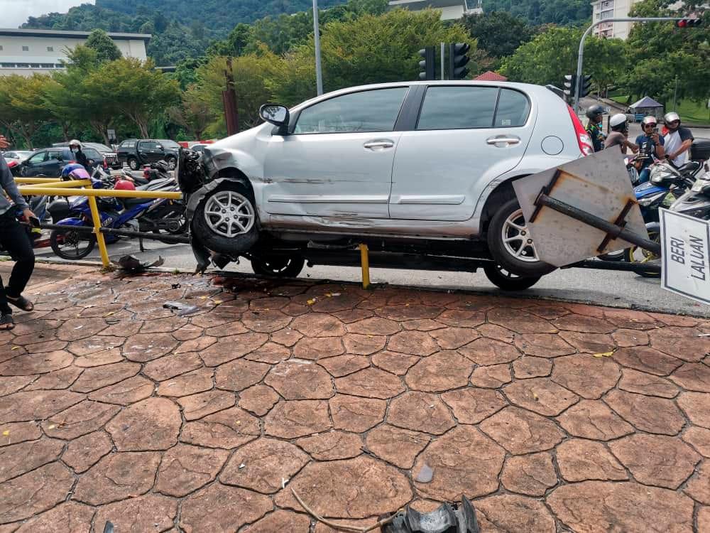 Four injured after car rams motorcycles