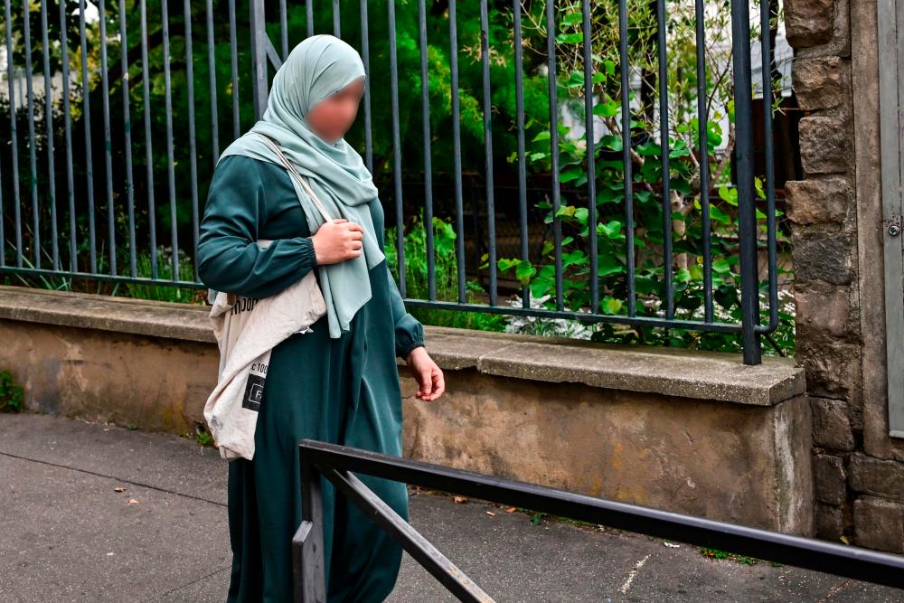 French ban of abaya in schools draws applause, criticism French ban of abaya in schools draws applause, criticism