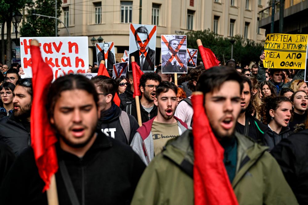 Greece sacks police chief after train tragedy protests Greece sacks police chief after train tragedy protests