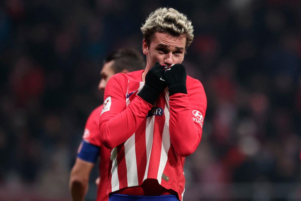 Griezmann ties Aragones goals record in Atletico draw