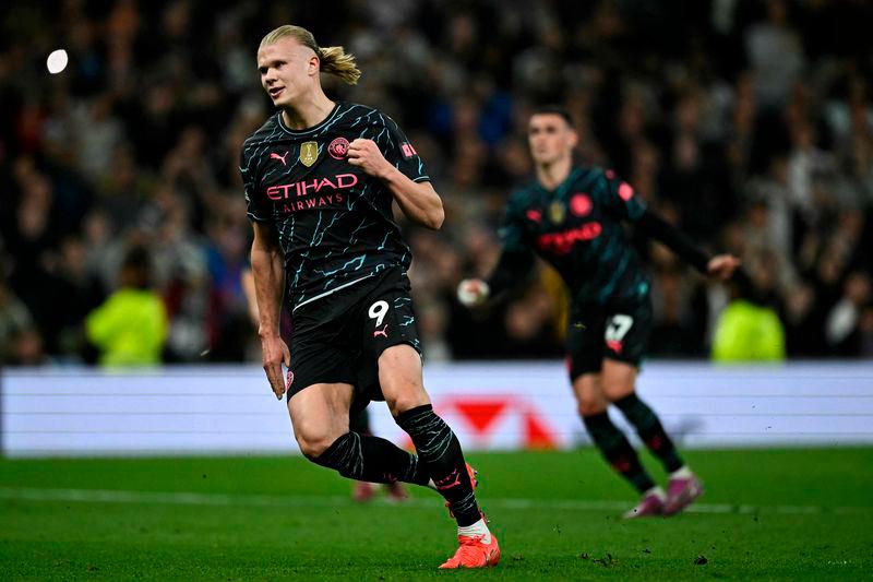 Haaland double puts Man City on brink of Premier League history