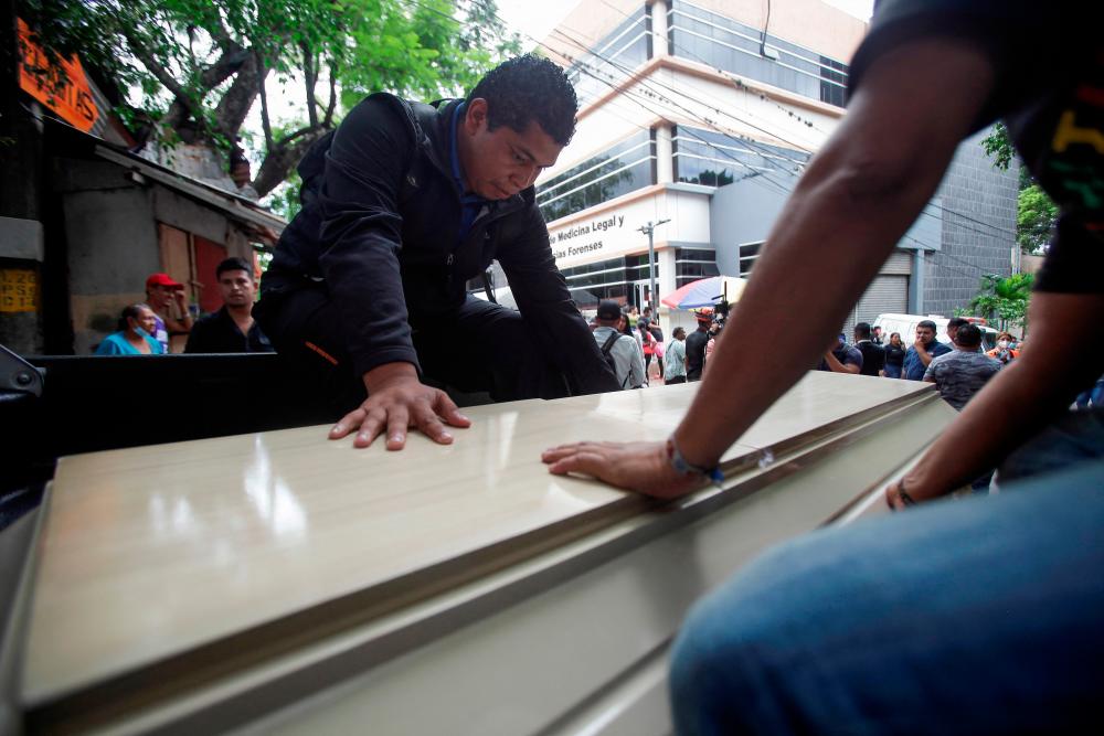 Honduran families seek answers as prison riot deaths rise to 46
