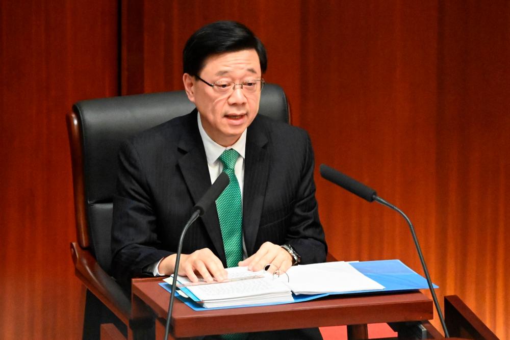 Hong Kong’s leader says to create new national security law in 2024